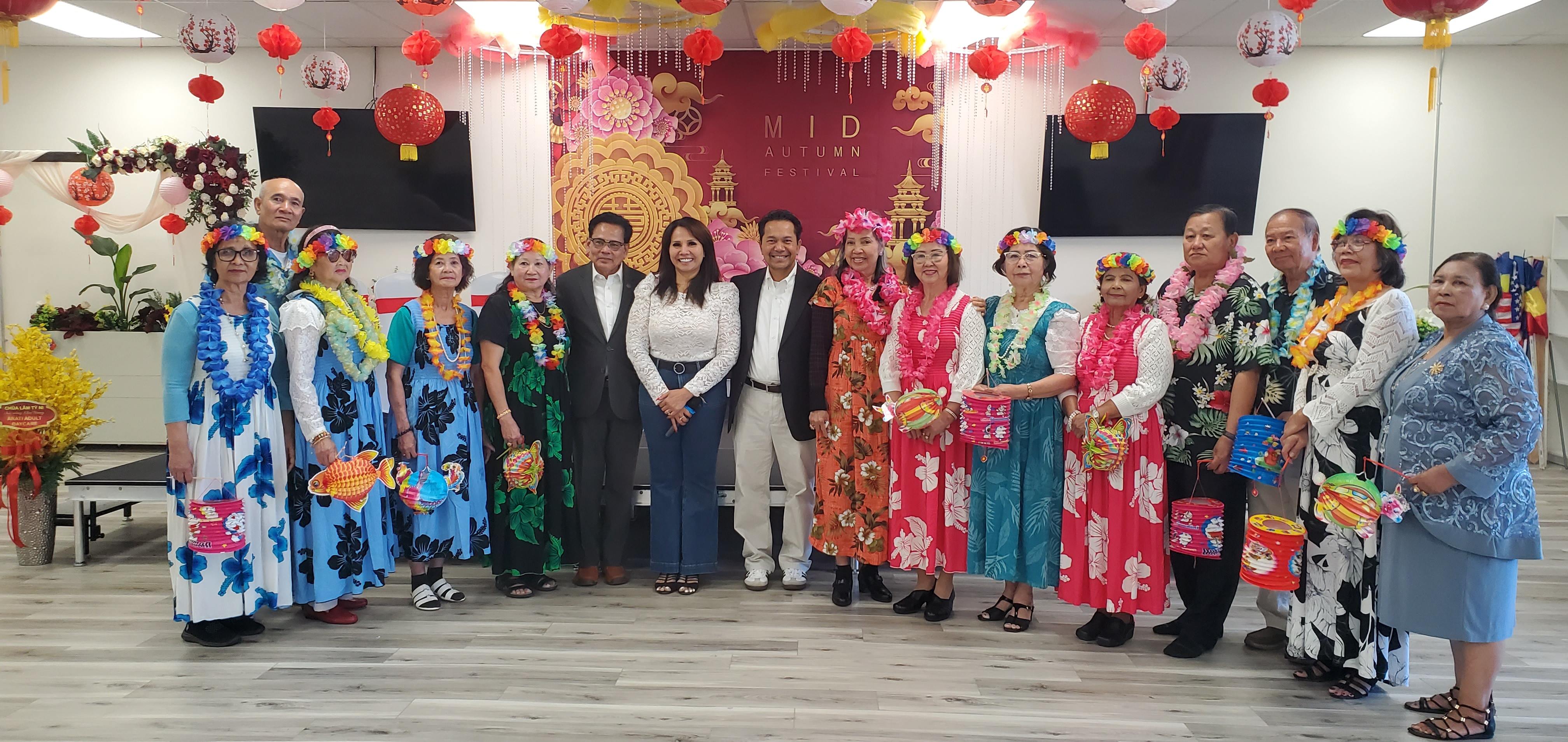 Sam Meas at Mid-Autumn Festival with community members